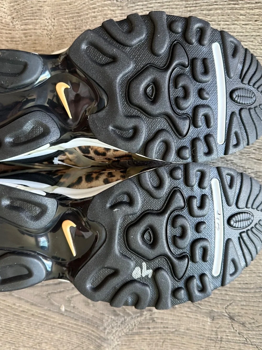 Nike Air Kukini SE Leopard slip-ons. NWOT.
